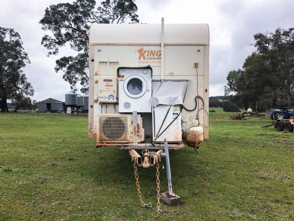 Washing machine and dryer mounted externally